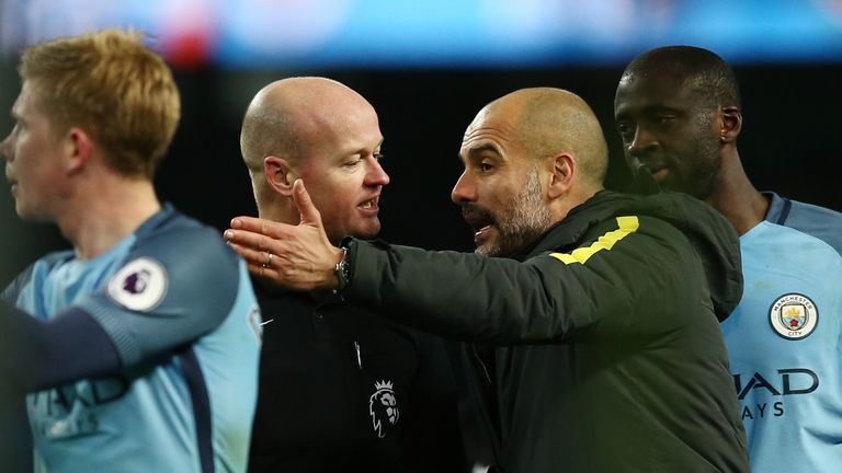 Guardiola remonstrates with referee Lee Mason