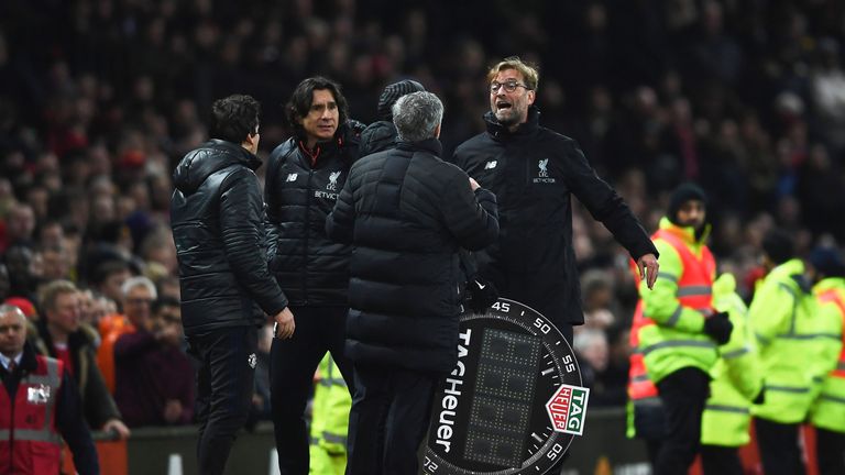 Jose Mourinho and Jurgen Klopp exchange words on the touchline last season