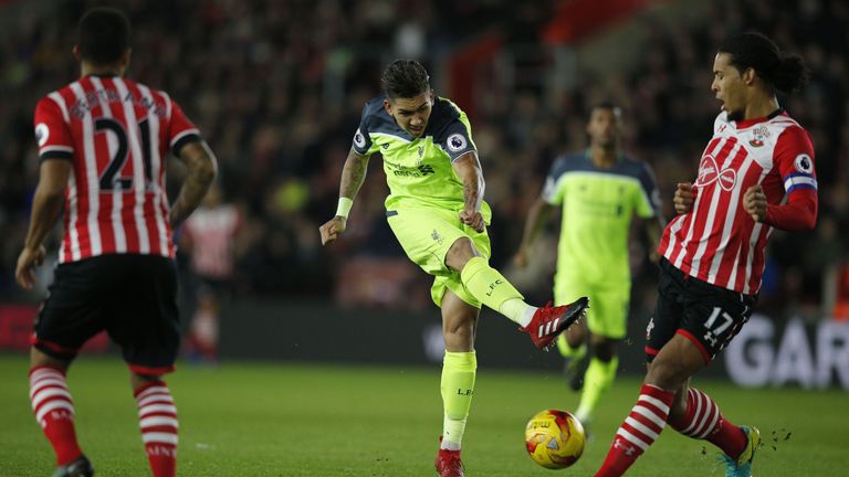 Van Dijk blocks a shot from Roberto Firmino
