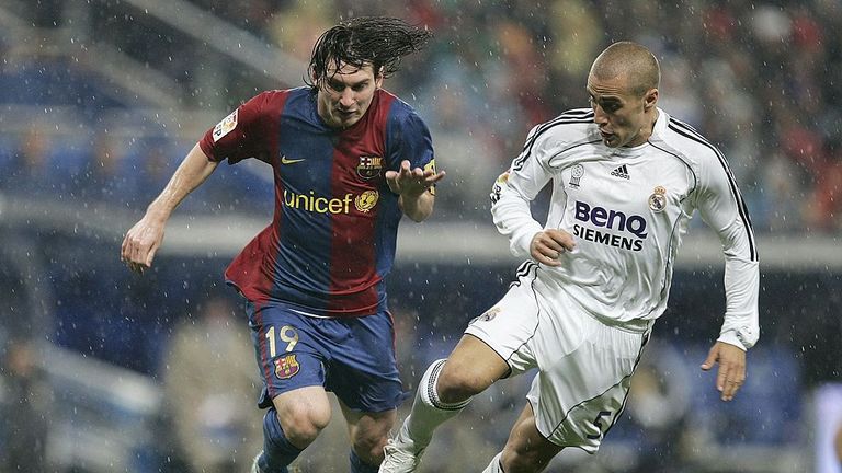 Cannavaro battling with a young Lionel Messi during El Clasico