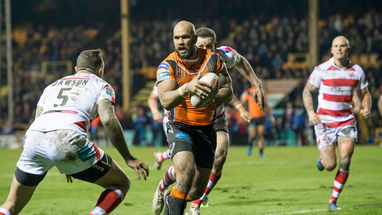 Castleford's Jake Webster runs with the ball against Leigh.