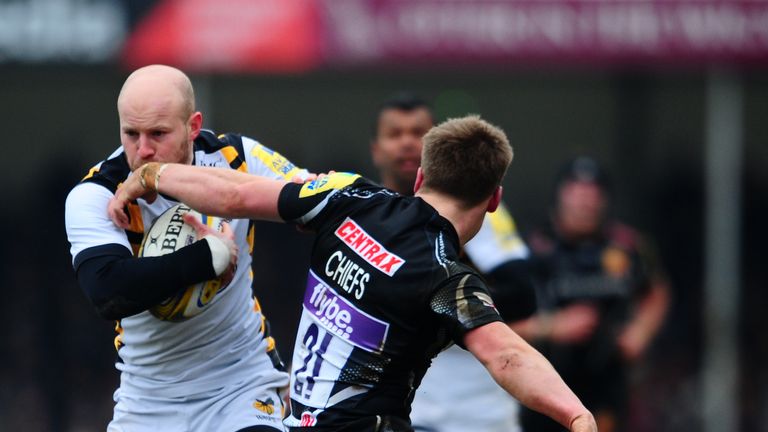 Joe Simpson breaks the tackle of Stuart Townsend on his way to scoring the game-tying try