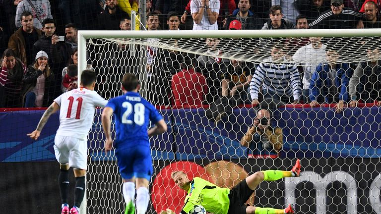 Kasper Schmeichel saves a penalty from Correa