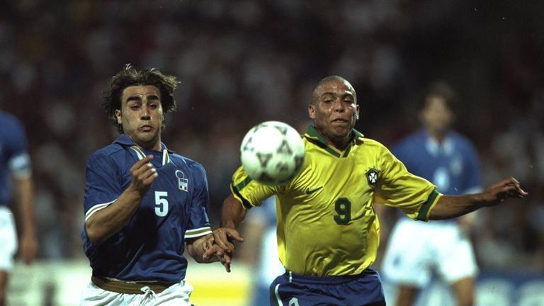 Cannavaro battling with Brazil legend Ronaldo (R) in 1997