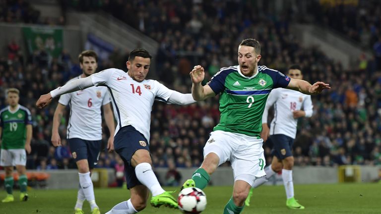 Washington competes with Omar Elabdellaoui at Windsor Park