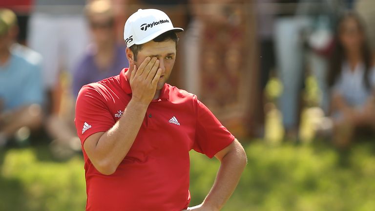 Rahm shows the strain after being five down after eight, but he began his fightback at the ninth