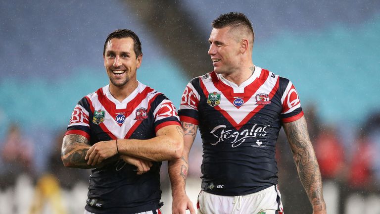 Mitchell Pearce (left) and Shaun Kenny-Dowall celebrate after beating the Rabbitohs