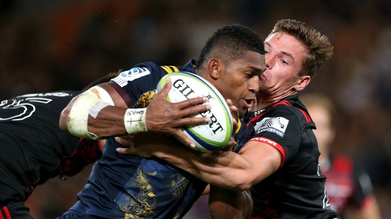 Waisake Naholo (L) of the Highlanders and George Bridge of the Crusaders 