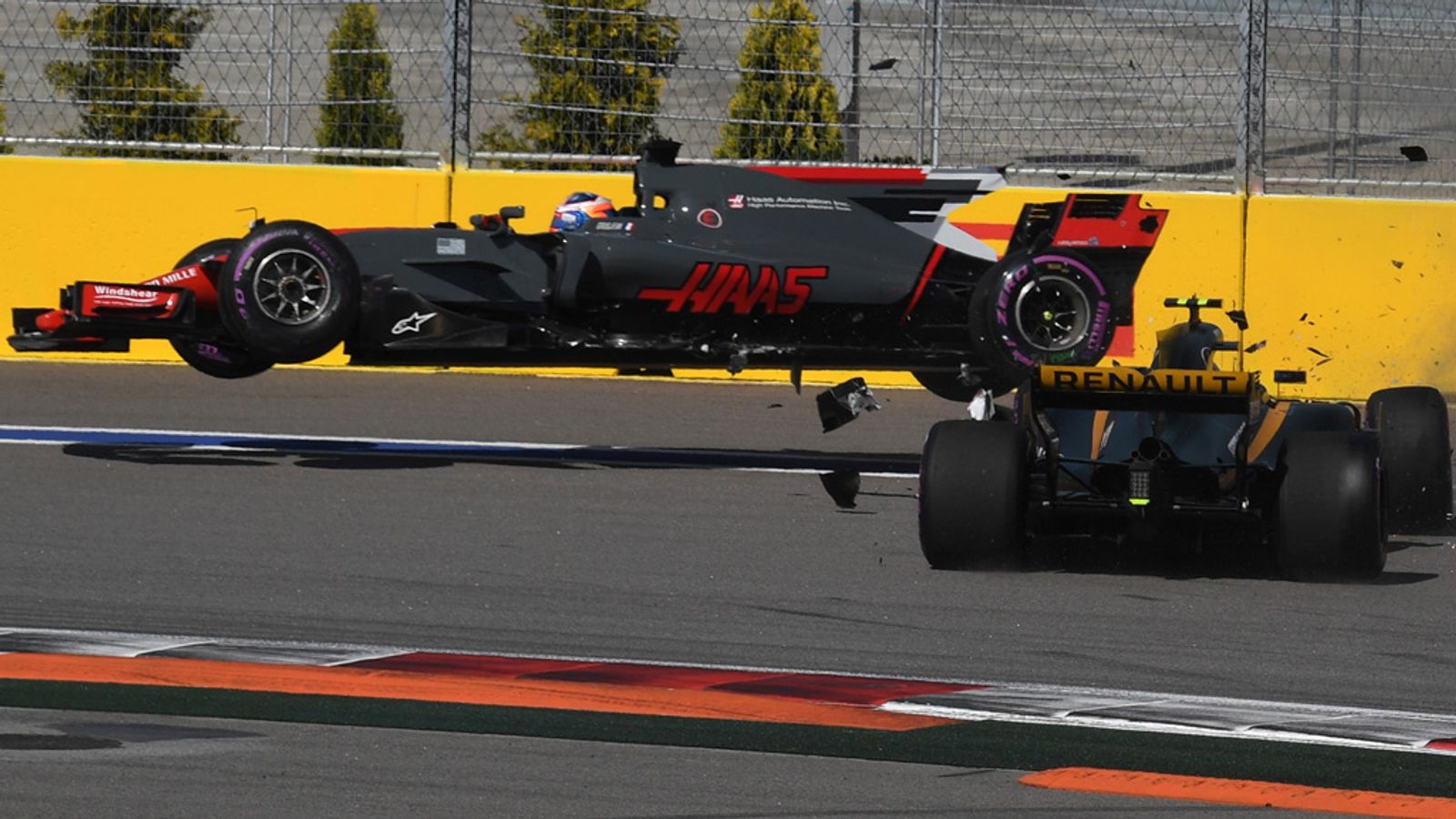 WATCH Romain Grosjean sent airborne in Jolyon Palmer crash at Russian