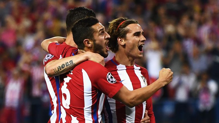 Griezmann celebrates with team-mates