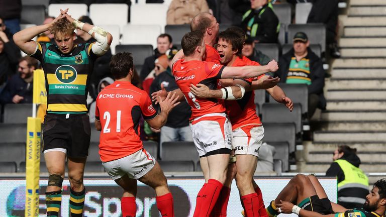  Marcelo Bosch is mobbed by his Saracens' team mates after scoring the last minute try to beat Northampton