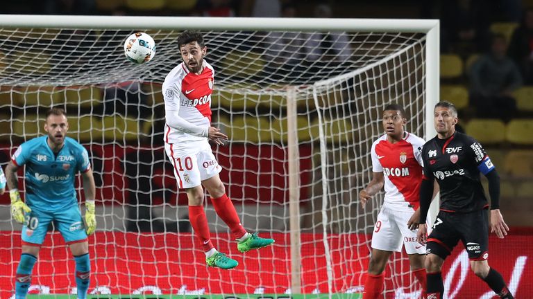 Bernardo Silva (C) goes for a header during Monaco's 2-1 win against Dijon