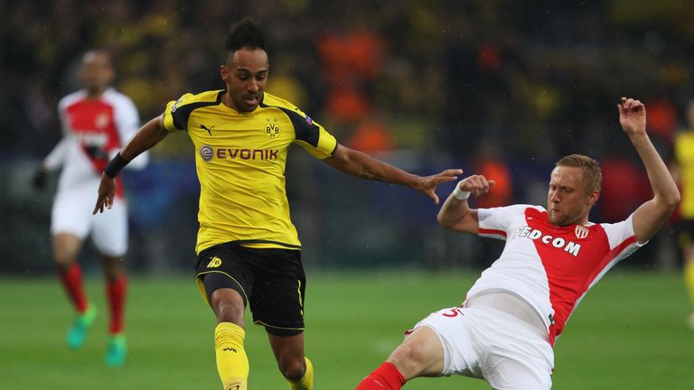 Kamil Glik looks to tackle Pierre Emerick Aubameyang in the first half