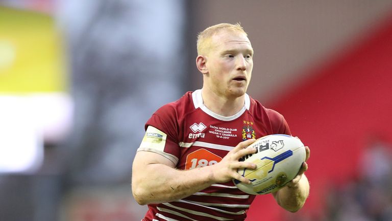 Wigan led at the interval thanks to Liam Farrell's try