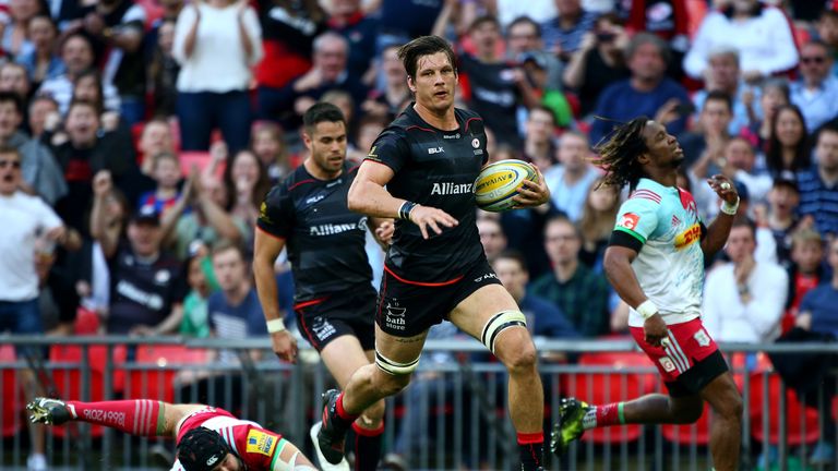 Saracens Michael Rhodes breaks through to score their third try at Wembley