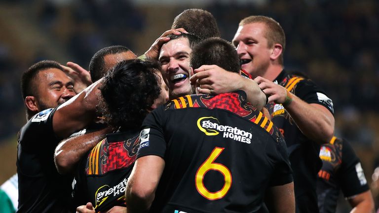 The Chiefs celebrate after Stephen Donald goes over against the Reds