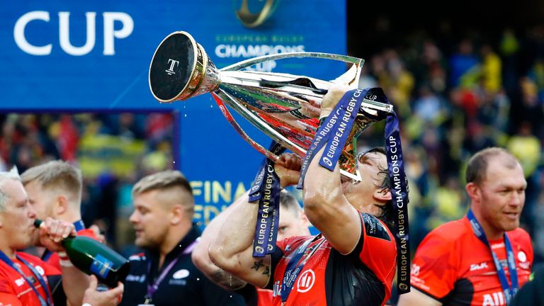 Saracens flanker Michael Rhodes drinks from the trophy in Edinburgh