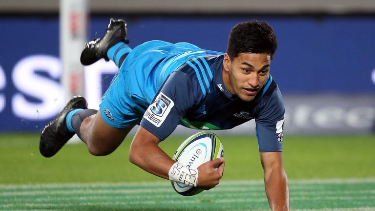 Blues' Rieko Ioane dives in for a try against the Cheetahs