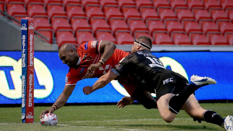 Rob Lui dives over for Salford's seventh try