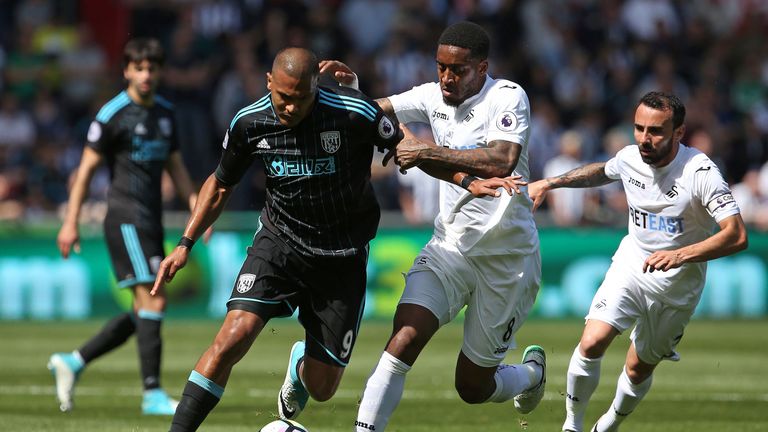 Leroy Fer puts pressure on Salomon Rondon at the Liberty Stadium