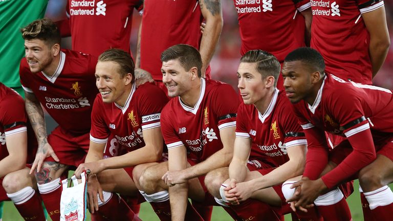 Steven Gerrard poses in a Liverpool line-up
