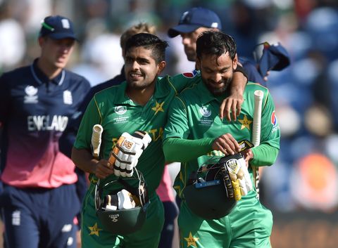 Pakistan's Babar Azam and Mohammad Hafeez celebrate victory