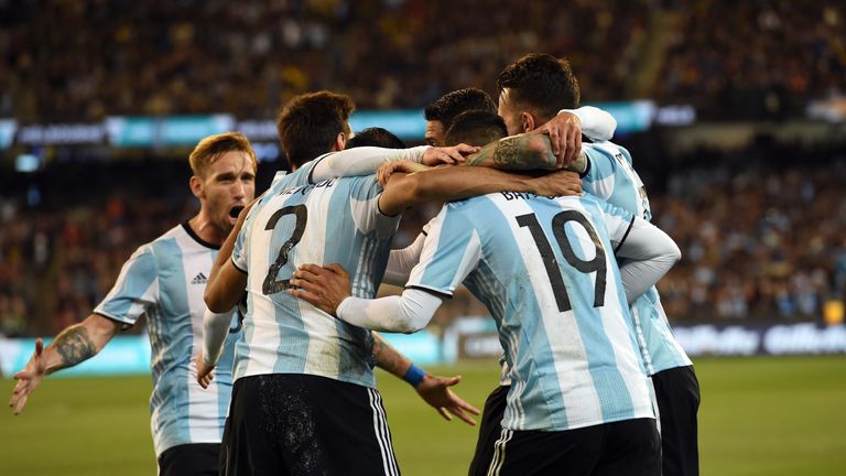 Argentina's players celebrate Mercado's goal