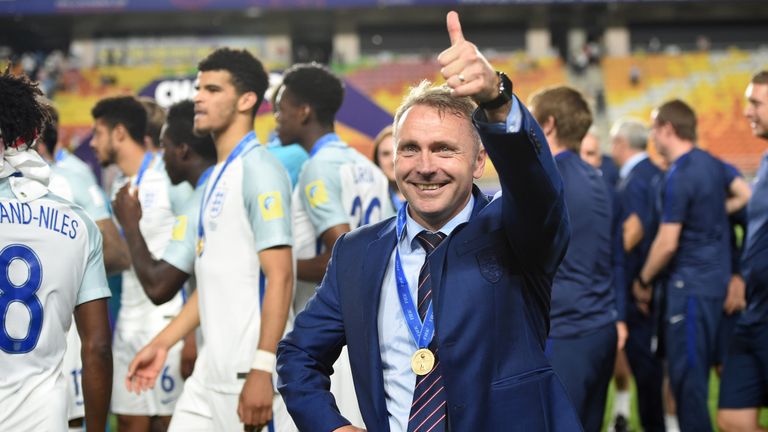 England's coach Paul Simpson celebrates the victory