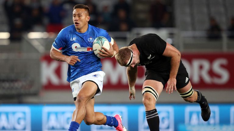 Samoa's Tim Nanai-Williams gets away from Sam Cane 