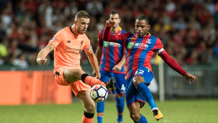 Jordan Henderson battles with Jason Puncheon