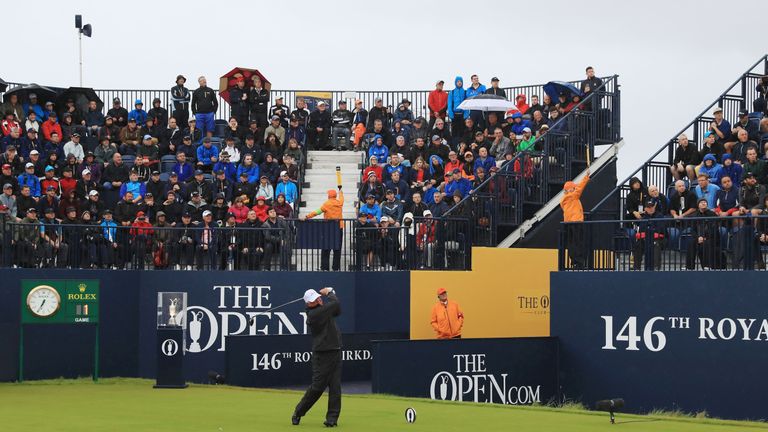 The stand around the first tee was packed to see Mark O'Meara strike the opening blow