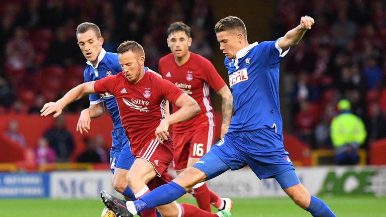 Aberdeen's Adam Rooney in action with Siroki Brijeg's Bernardo Matic