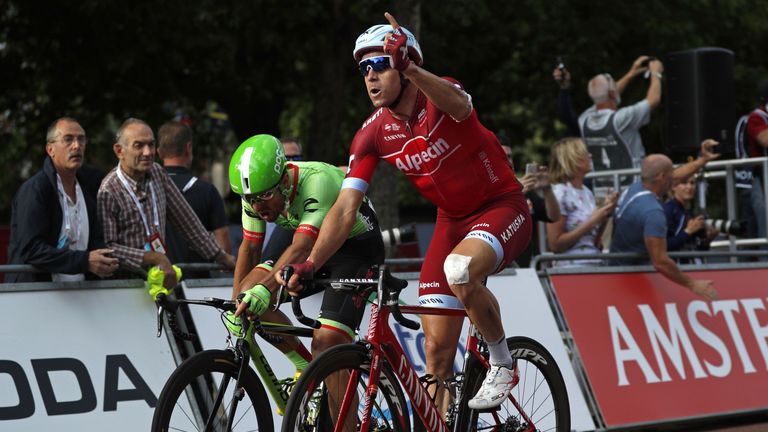 Norway's Alexander Kristoff of Team Katusha Alpecin celebrates after his victory in the final sprint on the Mall