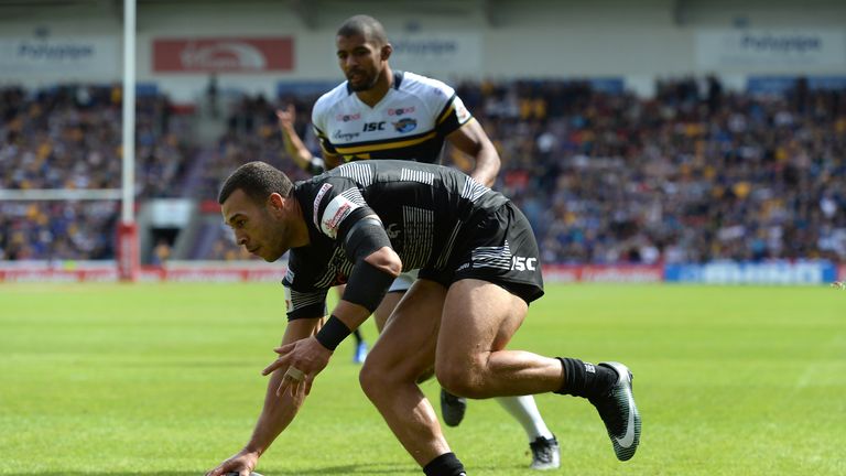 Carlos Tuimavave scores Hull FC's fourth try of the match