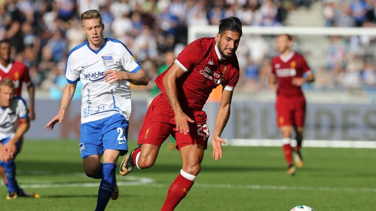Emre Can looks to win possession