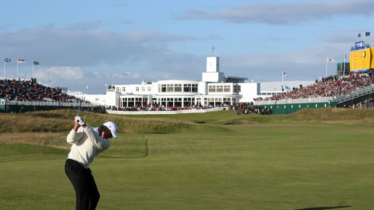 Greg Norman plays his approach shot to the 18th green at Royal Birkdale during the third round of the 137th Open