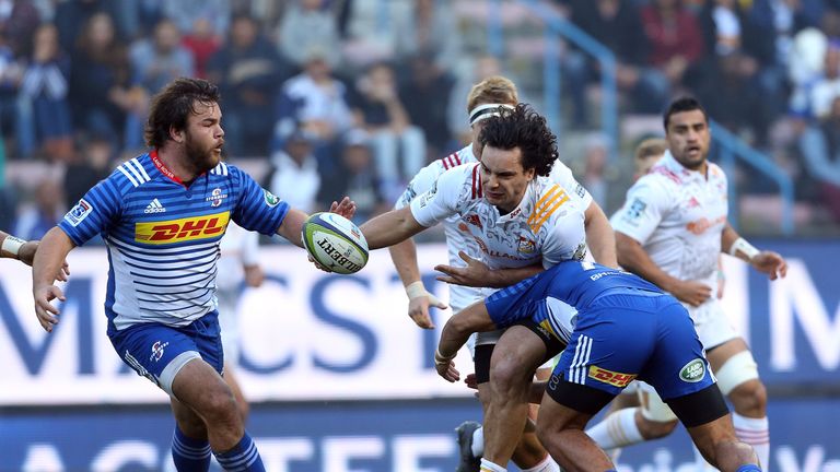 James Lowe looks to offload out of the tackle against the Stormers