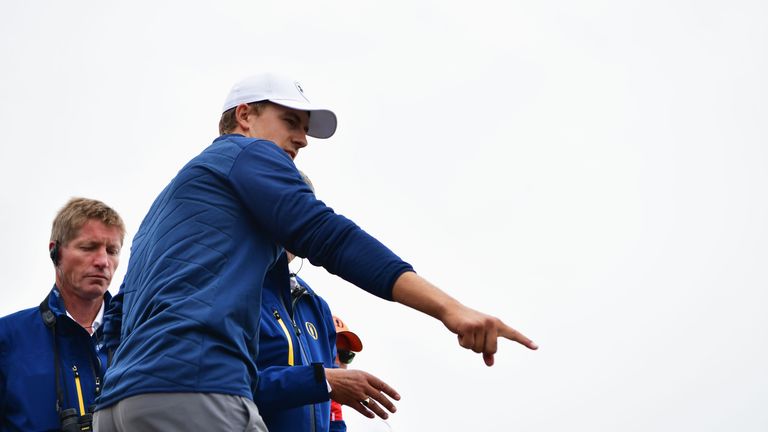 Spieth discussed with rules officials for nearly 20 minutes about where he would take his penalty drop