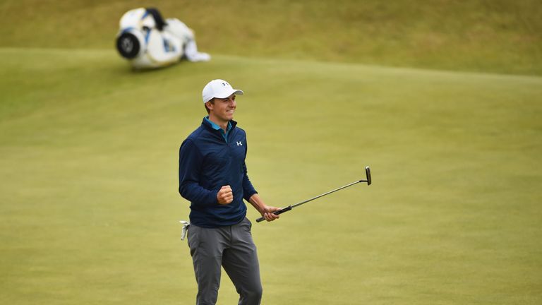 Spieth celebrates victory after holing the winning putt 