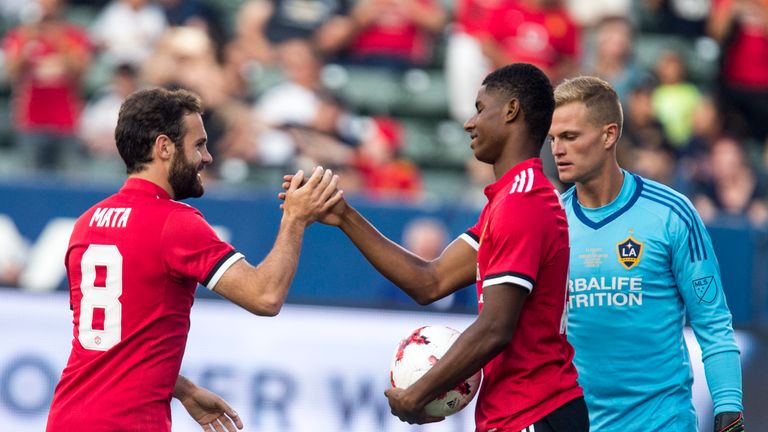 Rashford (left) scored twice in Saturday's win over LA Galaxy