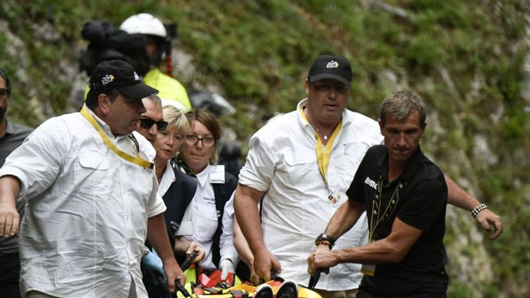 Australia's Richie Porte is stretchered off the road after his crash 