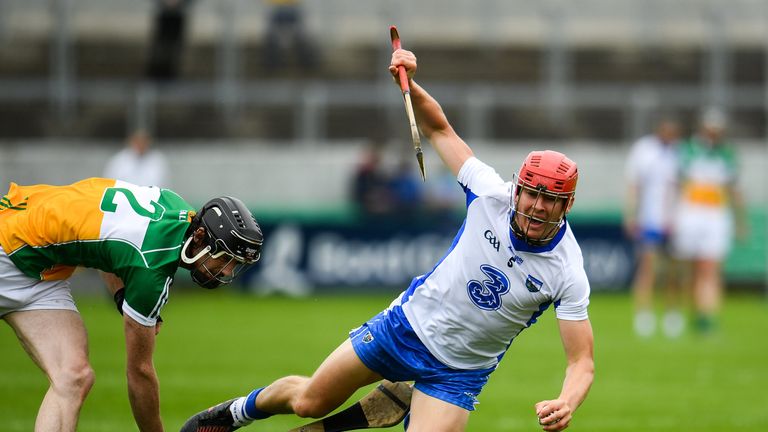 Tadhg de Burca of Waterford is fouled by Offaly's Ben Conneely 