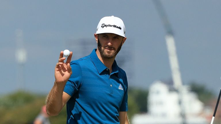 Dustin Johnson acknowledges the crowd after a birdie on the 15th hole during the third round of The Open