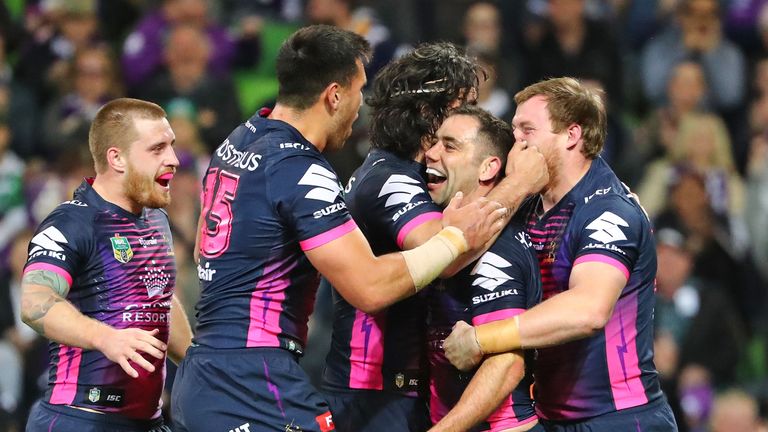 Cameron Smith (centre) enjoyed a hugely-successful 2017, topping the NRL and leading Australia to World Cup victory