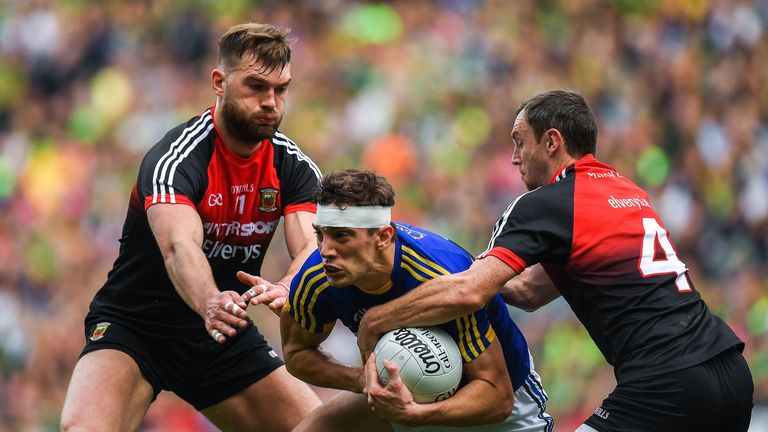 David Moran in action against Aidan O'Shea, left, and Keith Higgins