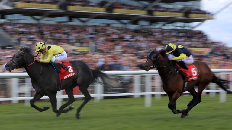 Defoe (left) on the way to winning the Betfred Geoffrey Freer Stakes