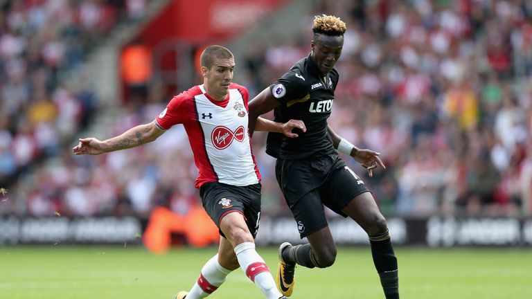 Oriol Romeu of Southampton challenges Swansea's Tammy Abraham