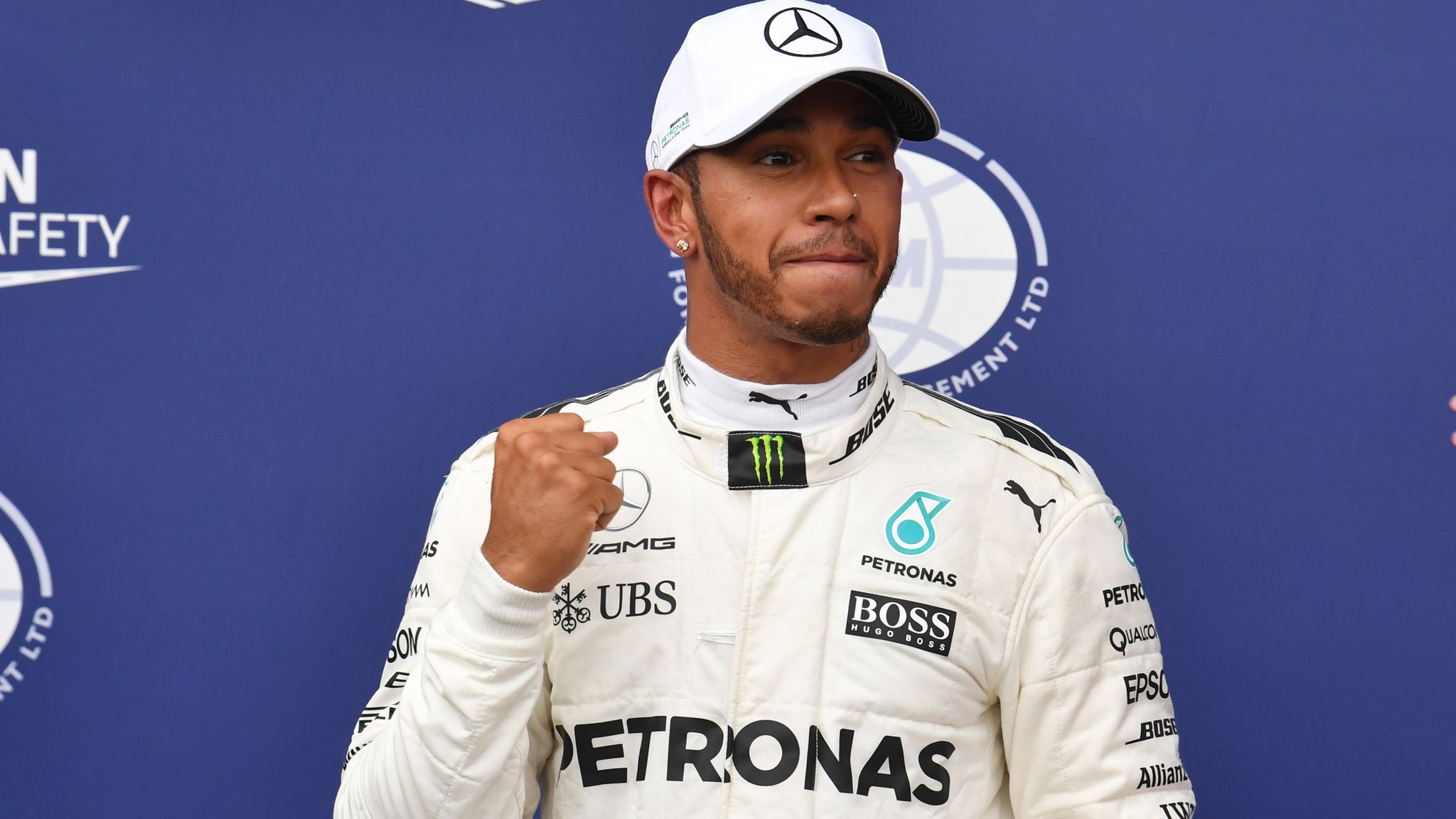 Monza, Italy. 2 September 2018. Formula One Grand Prix of Italy, race day;  Mercedes AMG Petronas Motorsport, Lewis Hamilton holds his trophy on the  podium as he wins the race Credit: Action