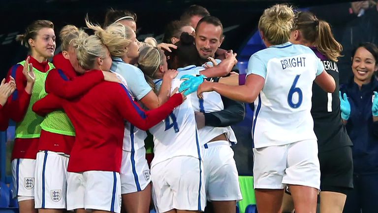 Nikita Parris and the England squad celebrate with Mark Sampson during a 6-0 win over Russia in September 2017