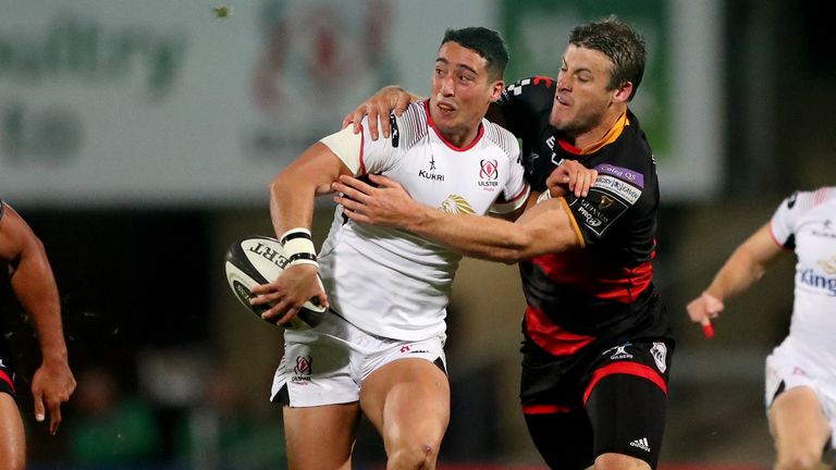 Brett Herron looks to offload the ball for Ulster